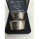 A cased pair of silver napkin rings Sheffield 1996