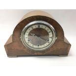 A walnut mantle clock