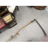 An old farming scythe