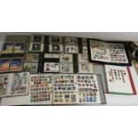 Five stamp albums containing world stamps includin