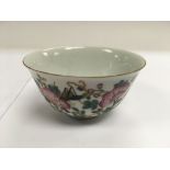 A small Chinese bowlwith hand painted decoration o