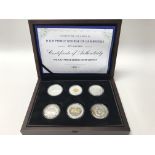 A cased set of 6 silver coins in commemoration of