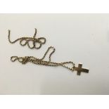A gold chain marked 10 ct with attached cross unma