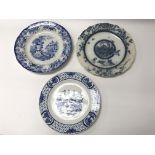 A colection of 9 blue and white ironstone plates.