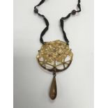 A vintage tortoiseshell type necklace.