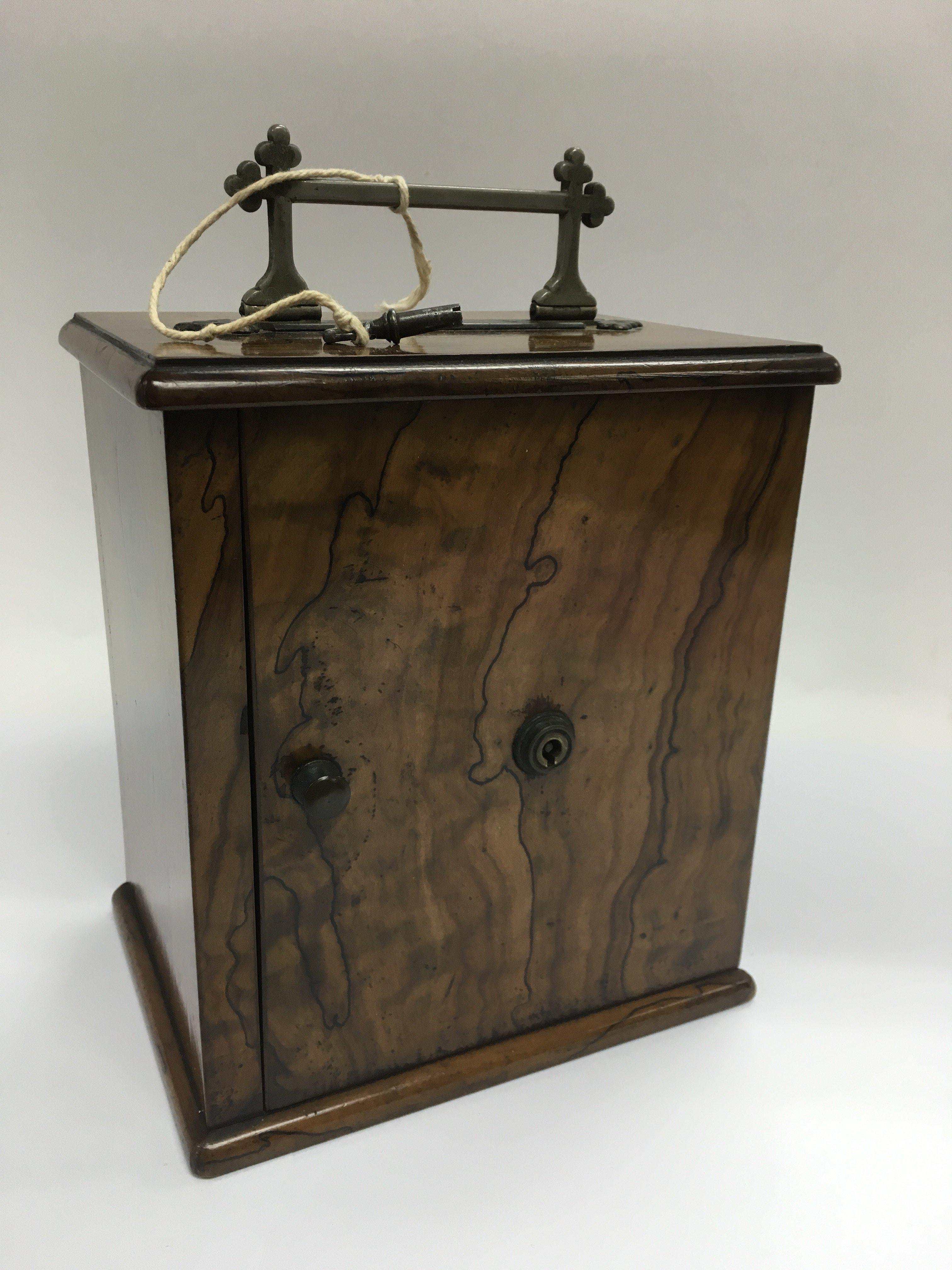 A walnut safe box, approx 16cm x 23cm x 12cm.