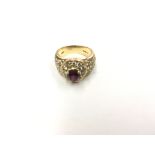 An 18ct ruby & diamond ladies ring. Ring size K.