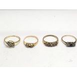 Four gold and stone set rings.Approx K,M and O, 8.