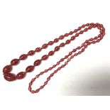 An Italian cherry coloured spun glass necklace.