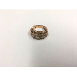 14ct rose gold ladies ring set with a pattern of d