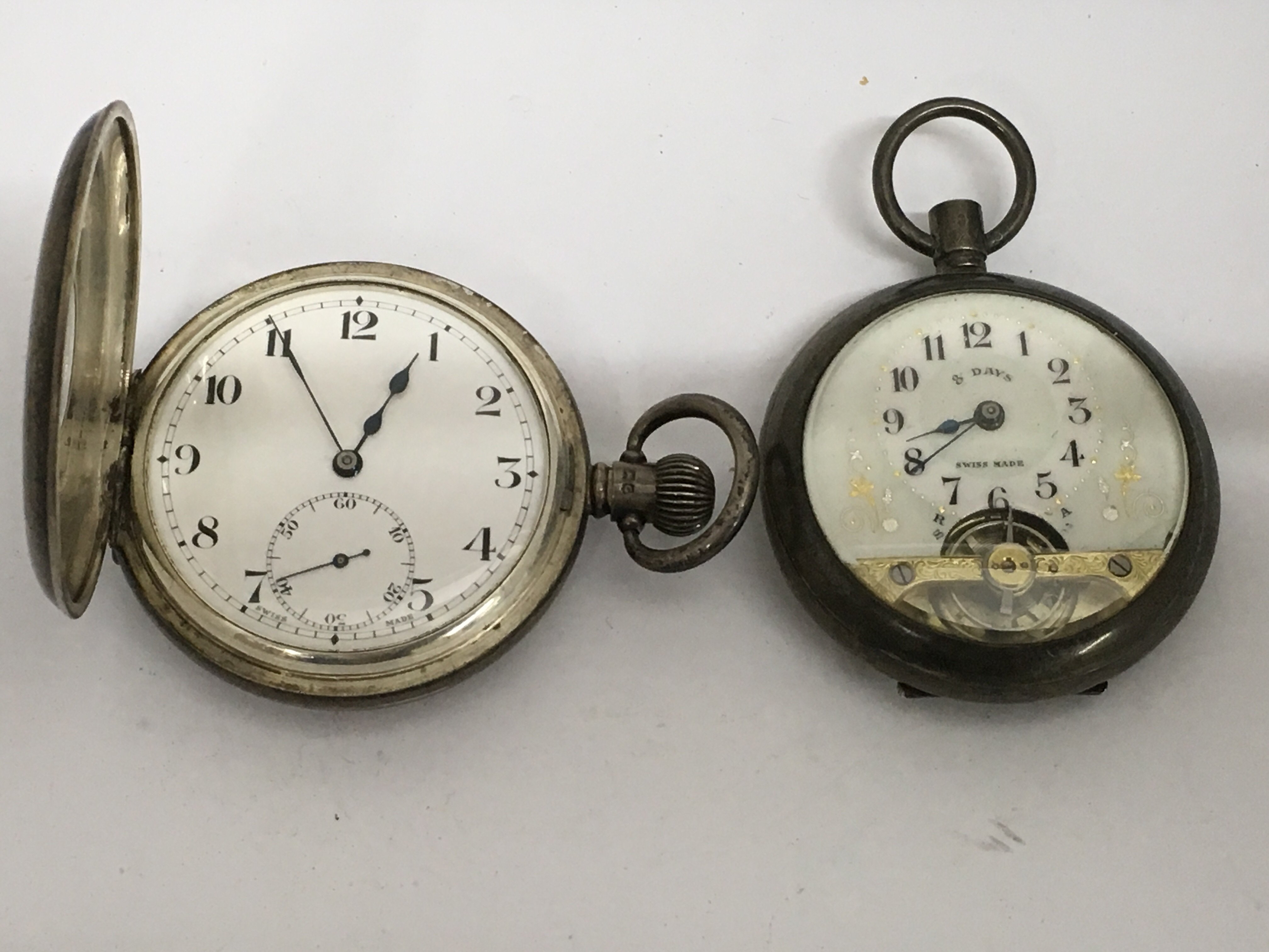 A silver and enamel half hunter pocket watch with
