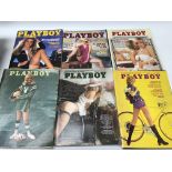 A collection of predominantly 1970's Playboy magaz