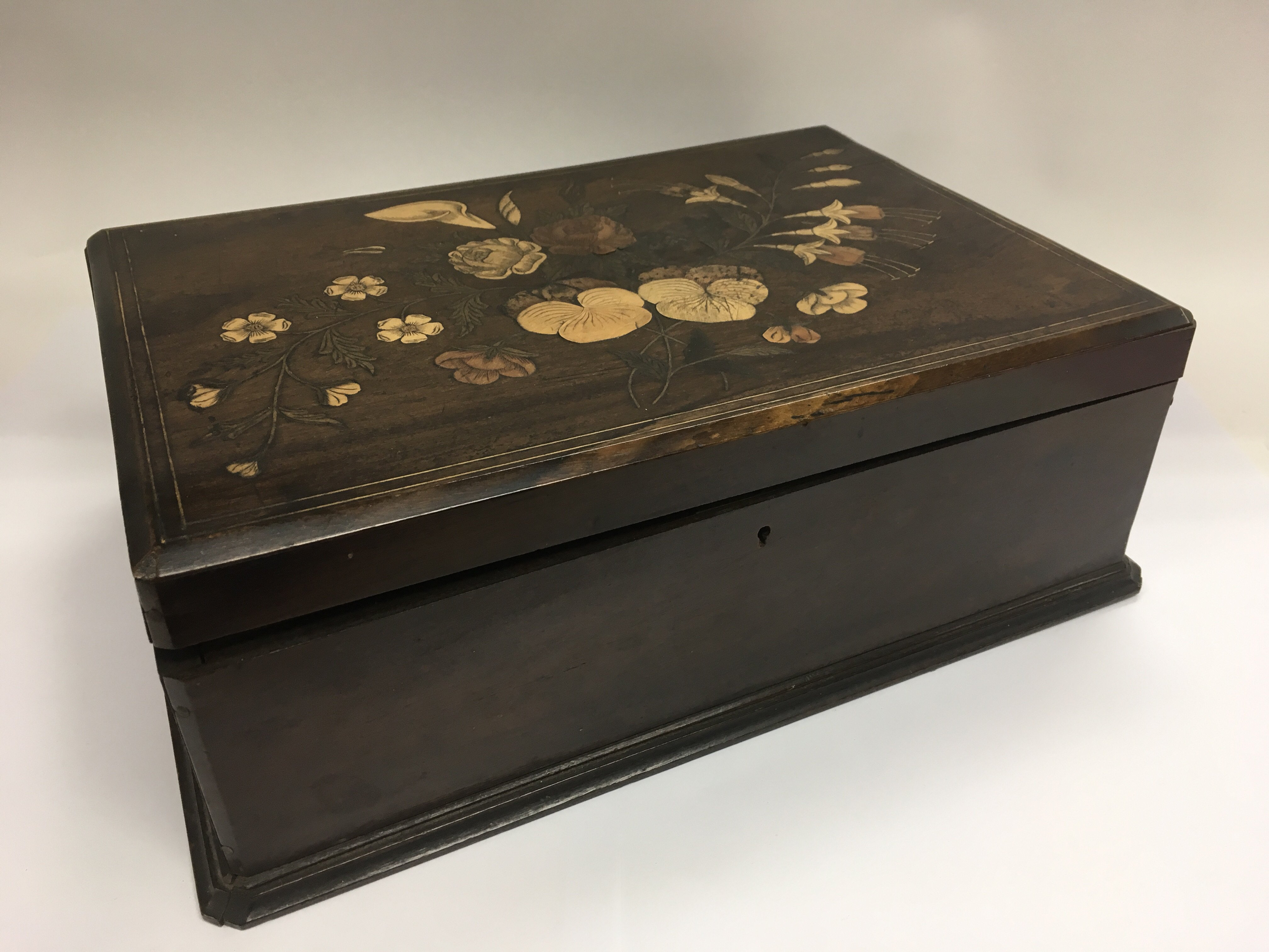 A marquetry sewing box with a fitted interior, app