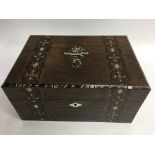 An inlaid workbox with fitted cloth interior.Appro