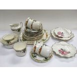 A hand painted on transfer tea service and three s