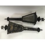 A pair of antique carriage lamps.