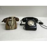 A pair of rotary telephones, one registered for So