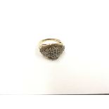 A Ladies 9ct Gold ring set with begette & brillian