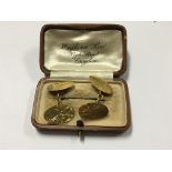 A Pair of 9ct Gold cufflinks in an old fitted box weight. 6g