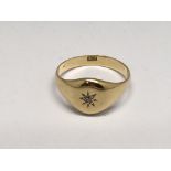 A gent's 18ct gold signet ring set with single sto