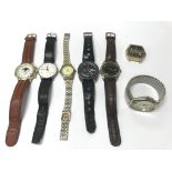 A collection of wrist watches.