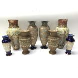 A collection of Royal Doulton vases including Doulton Slater.