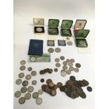 A collection of used circulated coins including co
