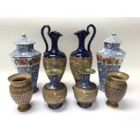 A collection of Royal Doulton items including a pair of Doulton Slater vases (some damage to