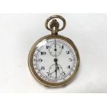 A gold plated button wind pocket watch, miles per