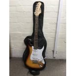 A Johnny Brook Stratocaster shape electric guitar with soft carry case plus a Fender Frontman amp (