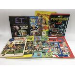 A collection of sticker albums including various P