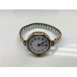 A 9ct gold cased Limit ladies wristwatch with repl