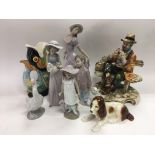 A collection of ceramics including Nao figures, a