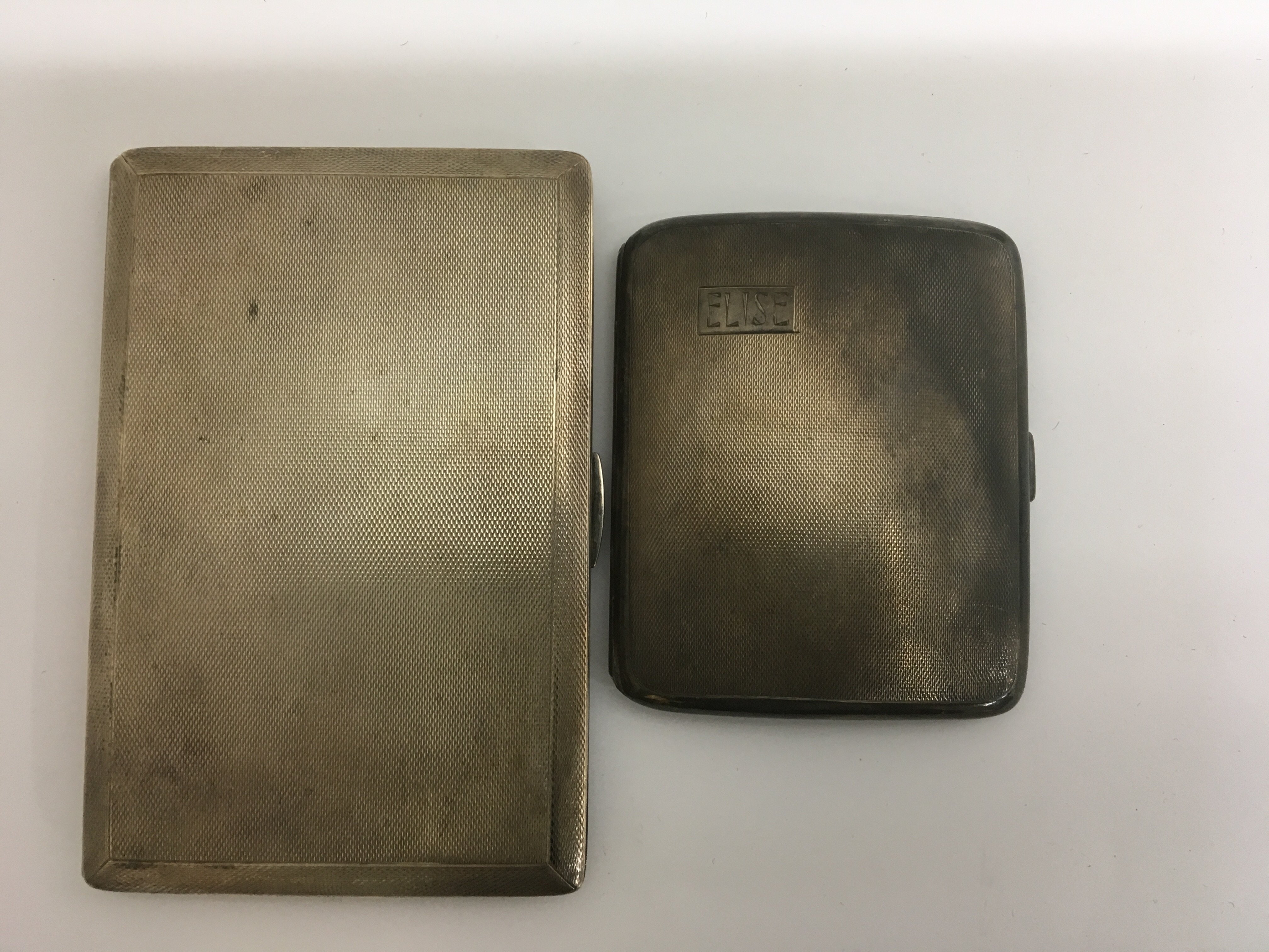 Two silver cigarette cases 245 grams