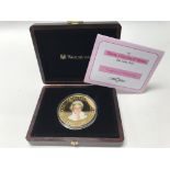 A cased Westminster 18ct gold coin in commemoratio