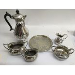 A Mappin Brothers coffee pot, two milk jug and suc
