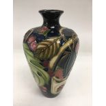 A modern Moorcroft vase of inverted baluster form