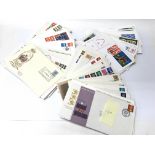 A box of definitive first day covers.