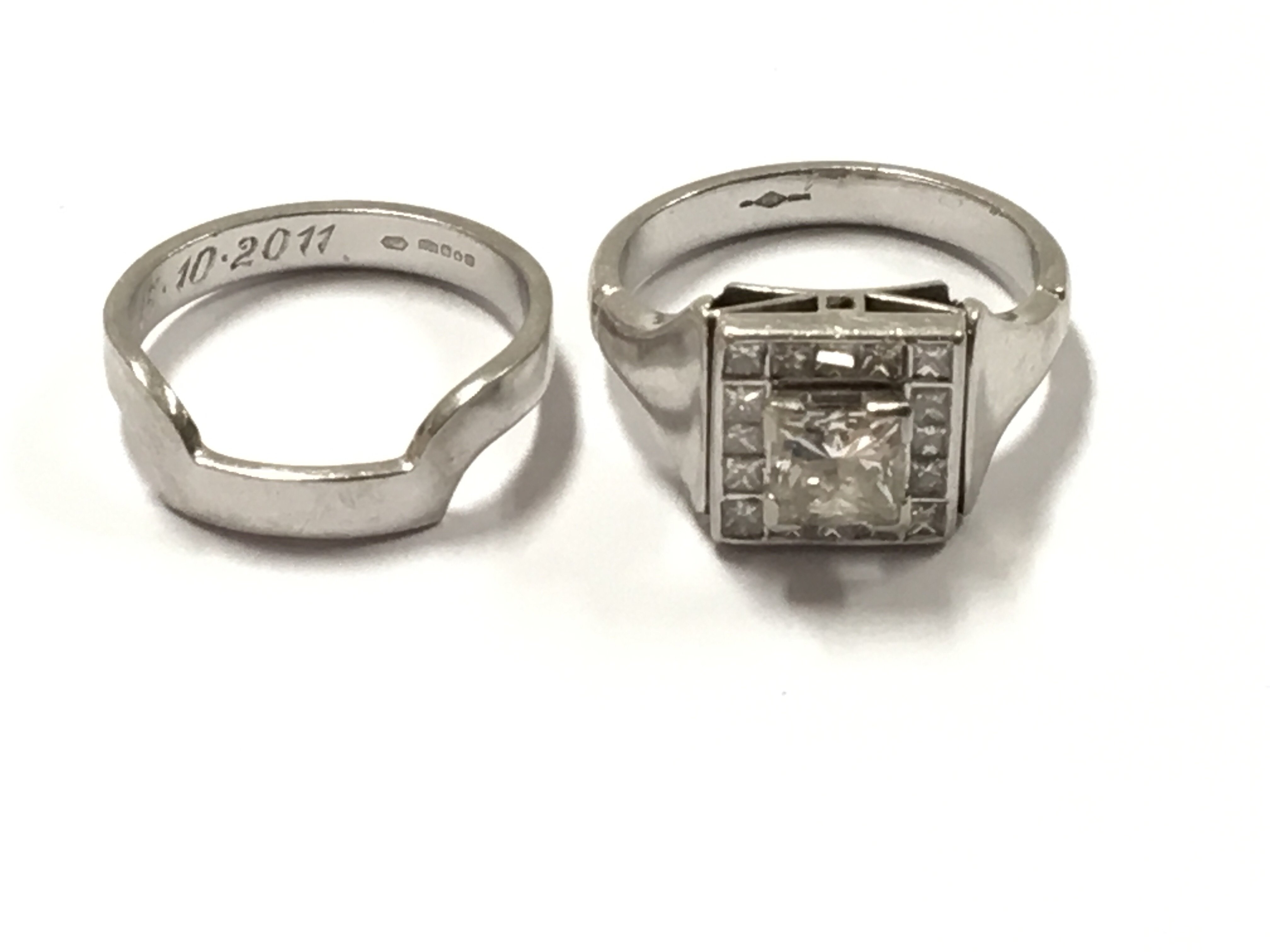 A unique design platinum and diamond ring set, the