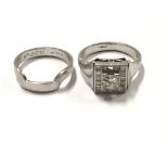 A unique design platinum and diamond ring set, the