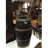 An oak brass bound stick barrel,