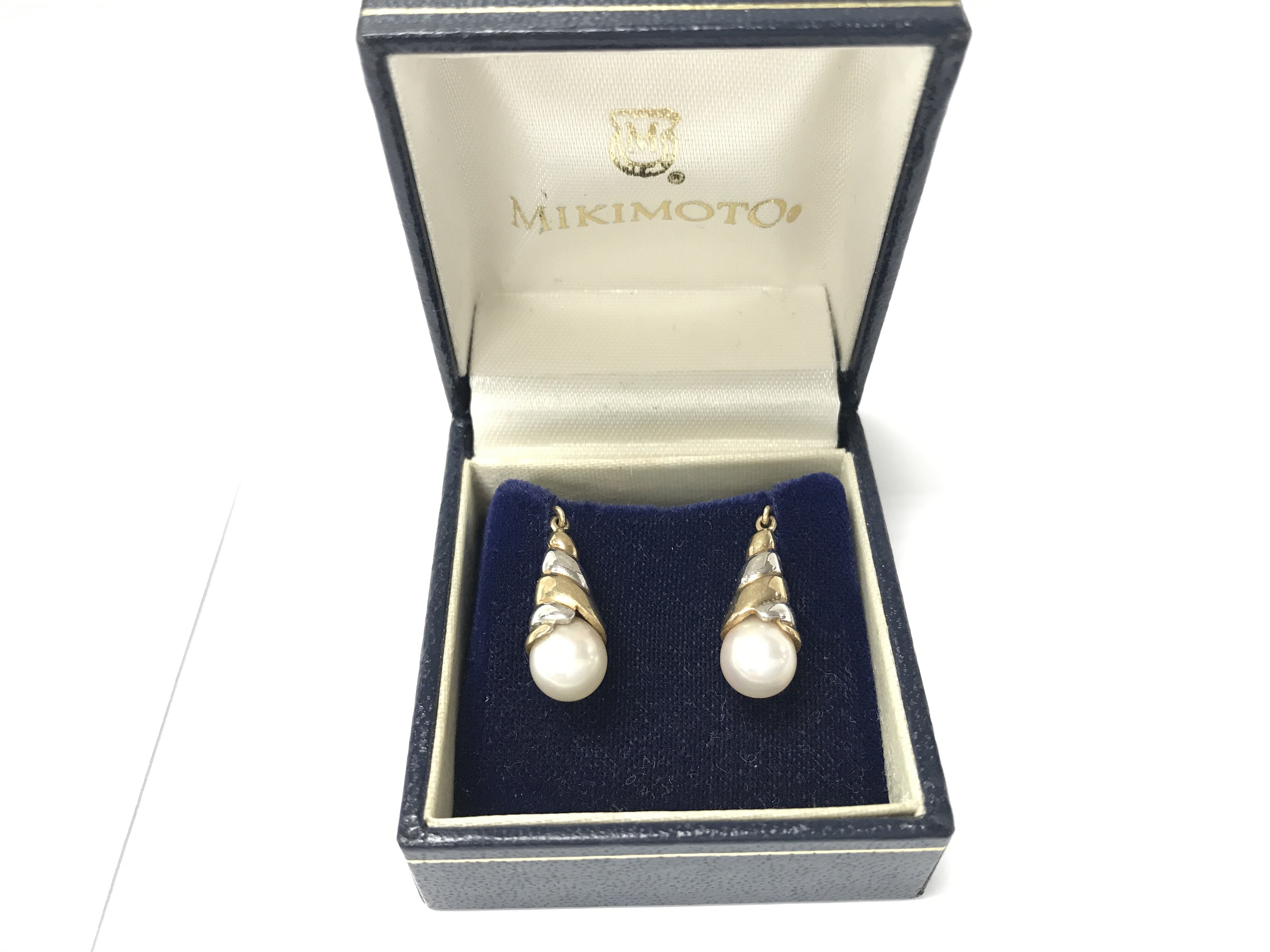 A pair of Mikimoto two tone 9ct gold and pearl ear