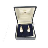 A pair of Mikimoto two tone 9ct gold and pearl ear