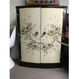 A 1950s cocktail cabinet decorated in the orietal