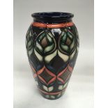 A signed Moorcroft vase by Sharon Austin, approx 1