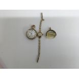 A gold plated pocket watch a wrist watch and a fob