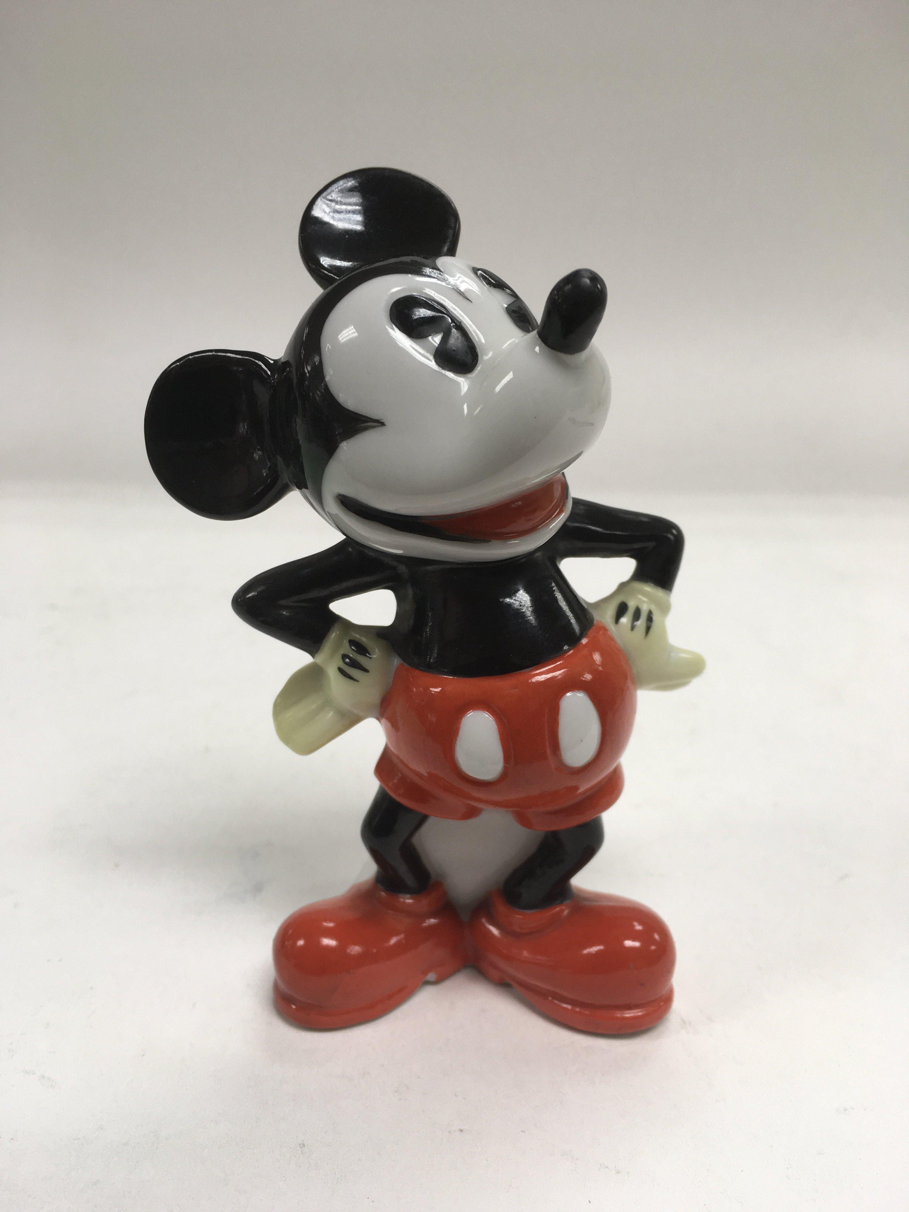 A ceramic Mickey Mouse spill vase, approx 10.5cm.