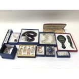 A large collection of boxed costume jewellery incl