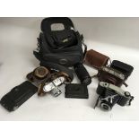 A bag of various cameras