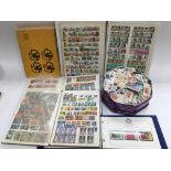 A box of First Day Covers, stamp booklets, loose s